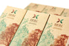 HNINA Organic Fairtrade Raw Dark Chocolate Bars that are Free of sugar, emulsifier, dairy, preservatives compostable Single Brick Box made of kraft paper and processed with wind energy.