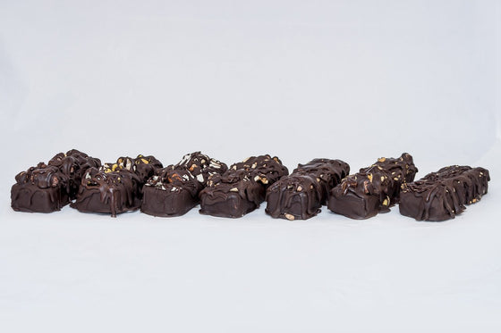 Our collection of raw dark chocolate bricks include sprouted Hazelnuts and Almonds, sprouted Macadamias and Pistachios, Coconuts, sprouted Brazil nuts and Almonds,Seeds, Pecan and Pines nuts, Walnuts and Cashews ad Pistachios and Hazelnuts.  