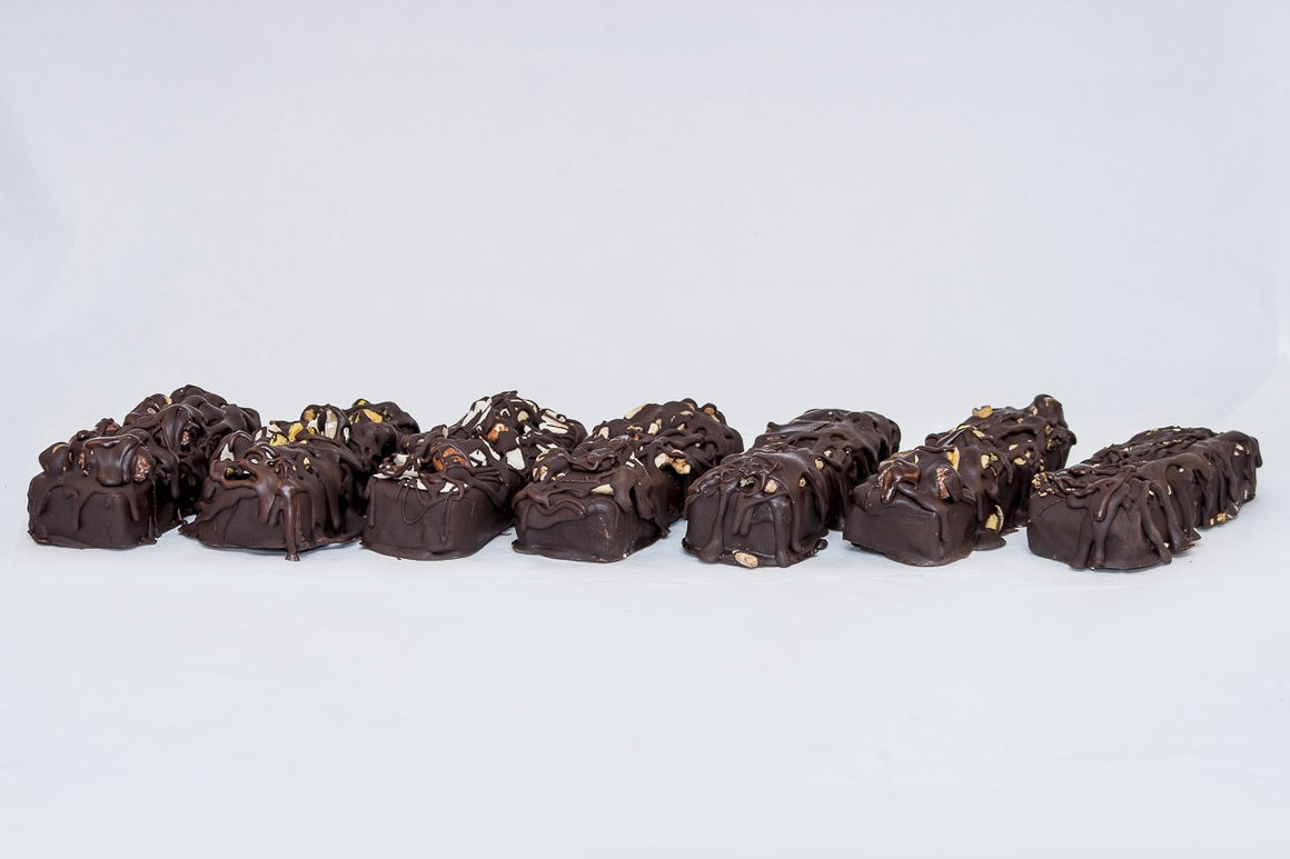 Our collection of raw dark chocolate bricks include sprouted Hazelnuts and Almonds, sprouted Macadamias and Pistachios, Coconuts, sprouted Brazil nuts and Almonds,Seeds, Pecan and Pines nuts, Walnuts and Cashews ad Pistachios and Hazelnuts.  