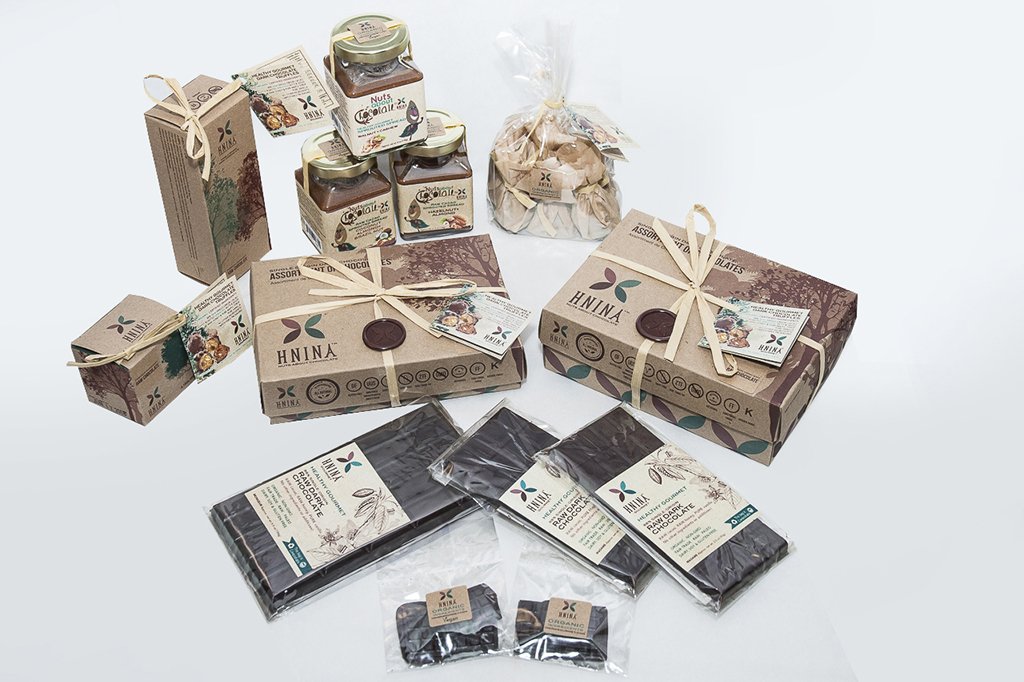 HNINA Organic Fairtrade Raw Dark Chocolate specialties are Free of sugar, emulsifier, dairy, preservatives include our pure raw dark chocolate tablets, assorted boxes, boulder and a brick of our pure raw dark chocolate truffles made with sprouted nuts or sprouted seeds and Nuts About Chocolate spreads. This can stop your sugar cravings by nourishing you with real nutrients dense foods. Get your body nourished with pure gourmet divine treats. 